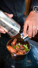 chef preparing a chicken wings