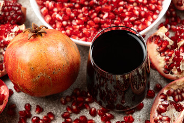 Natural pomegranate juice in a glass, close-up.