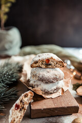 Christmas stollen cookies on the festive table, Scandinavian style, Scandinavian Christmas, candles, Christmas tree