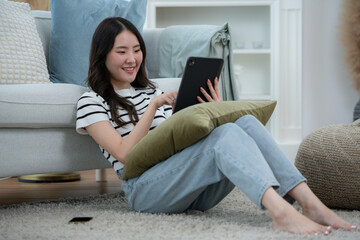 Asian young women with conducting their weekly holiday routines