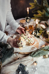 Cinnabon with marshmallows, buttercream and nuts on a festive table, Scandinavian style, Scandinavian Christmas