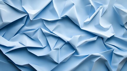 Elegant folded paper texture in soft pastel blue tones