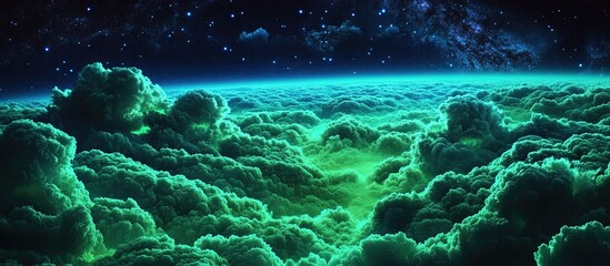 Fototapeta premium Green cloudscape over a glowing horizon under a starry night sky.