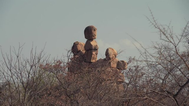 Rock formation  behind dried tree leaves in Matobo National Park Zimbabwe