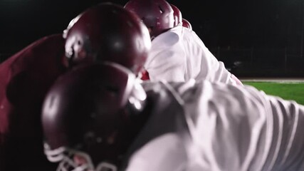 American Football Championship Start Teams Ready: Professional Players, Aggressive Face-off, Start Pushing, Tackling. Competition Full of Brutal Energy, Skill. Cinematic Slow Motion. Dramatic Sport