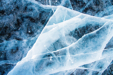 Deep blue ice texture, lake water frozen in winter, icy wallpaper, white snow