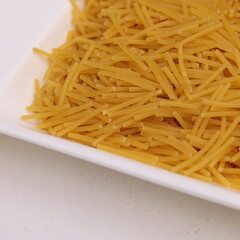 raw pasta on a plate