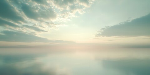 Fototapeta premium Large body of water with a cloudy sky in the background