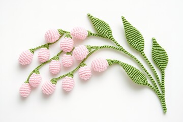 Delicate Pink and Green Knitted Floral Arrangement on White Background