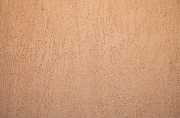 Background orange plastered wall with texture