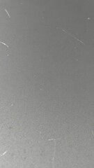 Grey scratched aluminum table top, close-up texture, surface texture, aluminium texture
