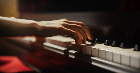 Close Up on Hands of a Talented Anonymous Pianist Making a Masterful Performance on a Grand Piano....