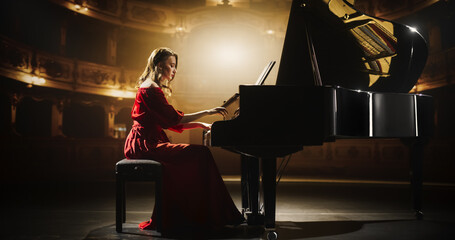 Emotional Female Performing Classical Instrumental Music on Stage. Young Musician Using a Grand Piano to Create Beautiful, Melodic Improvisation. Spectators Sitting in a Historic Concert Hall