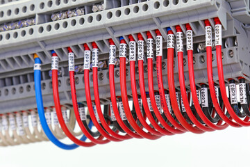 Electrical screw terminals for connecting wires in an electrical switchboard. Soft focus. Close-up.