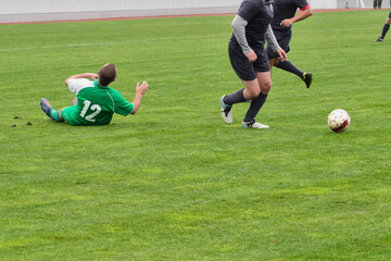 A football team defender takes the ball from an opposing attacker without a foul, a missed chance...