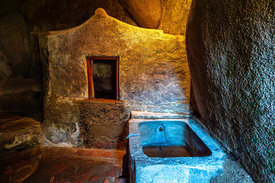 Abandoned and empty medieval Convento dos Capuchos in the Serra de Sintra National Park, Portugal