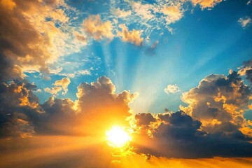 Naklejka premium The sky is painted with vibrant hues during sunrise and sunset, featuring a mix of blue and orange amidst the clouds.