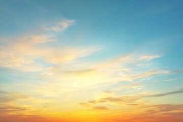 Obraz premium A stunning, luxurious soft gradient of orange and gold clouds illuminated by sunlight against a blue sky, perfect for a background, captured in the evening twilight. This is a large, high-definition