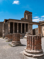 Ruins of basilica in the forum of Pompeii, Italy. Pompeii was destroyed by the volcanic eruption of Vesuvius in 79 BC