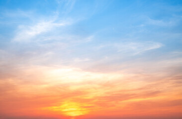 Sky,sunset, beautiful , luxury soft gradient orange gold clouds and sunlight on the blue sky perfect for the background, Sunrise on morning or everning in winter warm time ,Twilight summer,silhouette