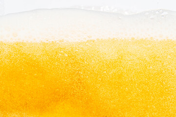 Close up bright orange Oil or beer splash texture and nature waves, Beautiful waves curve and little bubbles smooth for graphic design and background, Oil Bubbles, Soft beer bubbles, Selective focus