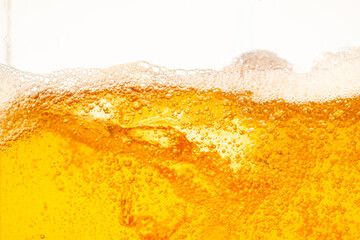 Close up bright orange Oil or beer splash texture and nature waves, Beautiful waves curve and...