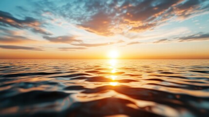 Obraz premium The serene ocean waves reflect the vibrant colors of a setting sun. The calmness of the water blends beautifully with the warm hues, capturing a peaceful moment.