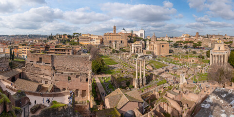 Panoramic view of the Roman Forum with ancient ruins and cityscape in Rome