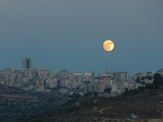 Red Moon Looking Over Ramallah City
