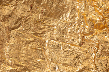 Gold Foil Texture Background: Luxury Shiny Wrinkled Metal Surface