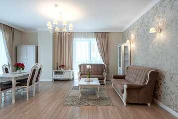 Elegant Home Living and Dining Room Interior with Modern Furniture and Large Windows. Modern Living Room Interior with Comfortable Sofas and Elegant Decor