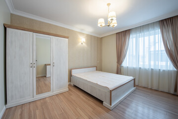 Modern Home Bedroom Interior with Minimalist Furniture and Bright Natural Light