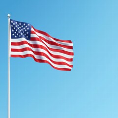 Fototapeta premium American Flag Waving Proudly Against Clear Blue Sky in Bright Daylight