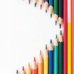 Fototapeta premium A vibrant array of colored pencils arranged creatively, perfect for art and design inspiration, showcasing various colors and tips.
