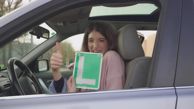 Young student driver showing learner permit, slow motion montage.