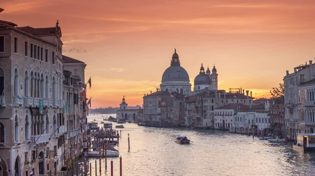 Venice italy city skyline aerial view of city old town gondolos sea sunrise time lapse in front cathedral venice grand canal.