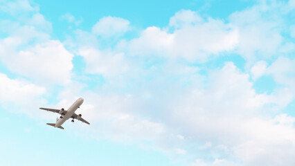 Airplane flies in blue sky. Travel, tourism. Airplane takes off against the background of blue sky.  ULTRA HD. 4K.
