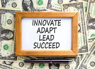 Innovate adapt lead succeed symbol. Concept words Innovate Adapt Lead Succeed on beautiful wooden...