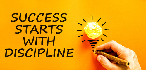 Success starts with discipline symbol. Concept words Success starts with discipline on beautiful...
