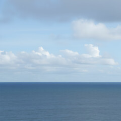 Fototapeta premium View of calm sea against cloudy sky