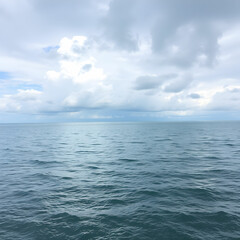 Fototapeta premium View of calm sea against cloudy sky