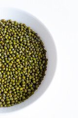 Top view of mung beans  in white bow