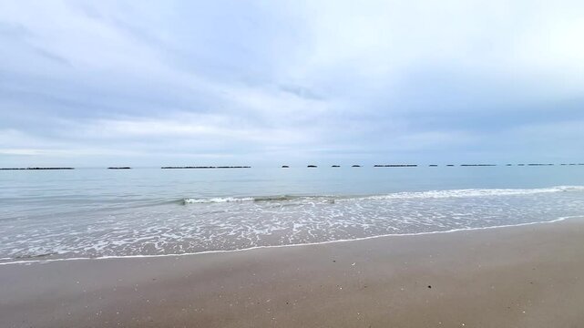 rimini beach in the early morning with beautiful sky in winter time