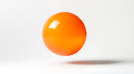 A rubber bouncy ball mid-jump against a white background, capturing motion and energy 
