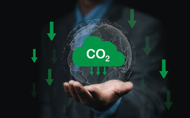 Concept of reducing CO2 emissions, reducing global warming sustainable development and green renewable energy business.