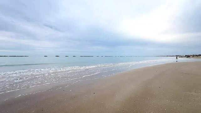 rimini beach in the early morning with beautiful sky in winter time