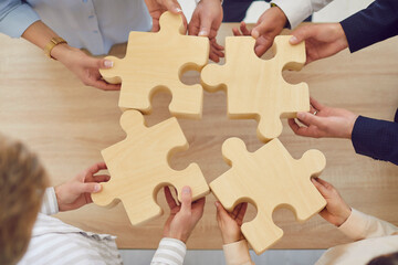 Puzzle idea matching, business teamwork with puzzle of pieces showing cooperation unity and...