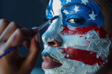 Woman with American flag face paint during creative makeup application, showcasing close-up detail of artistry and patriotic spirit in vibrant colors