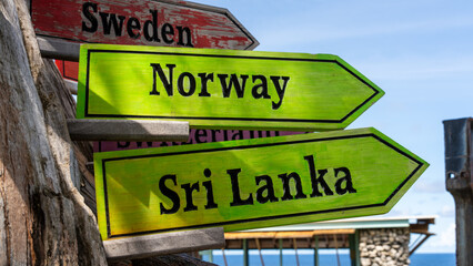 Colourful Directional Signs Pointing to Global Destinations