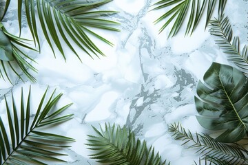 Obraz premium Tropical summer composition with palm leaves on marble paper.